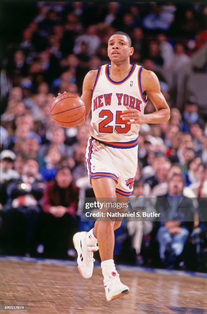 Doc Rivers of the New York Knicks handles the ball during the game ...