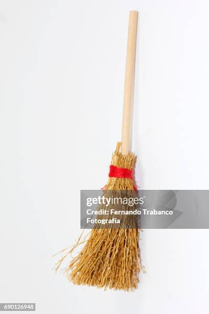 broom leaning against wall - broom stock pictures, royalty-free photos & images