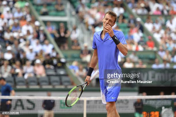Andrey Kuznetsov of Russia reacts during his men's single match against Andy Murray of Great Britain on day three of the 2017 French Open at Roland...
