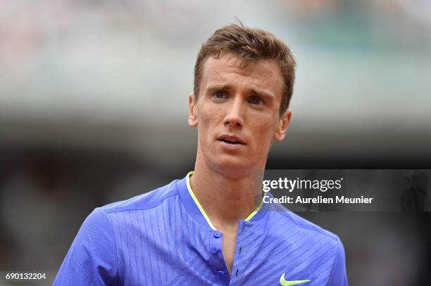 Andrey Kuznetsov of Russia reacts during his men's single match against Andy Murray of Great Britain on day three of the 2017 French Open at Roland...