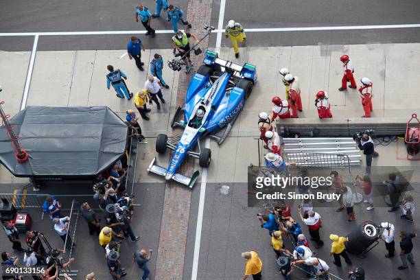 101st Indianapolis 500: Aerial view of Takuma Sato with crew members during pit stop of race at Indianapolis Motor Speedway. Verizon IndyCar Series....