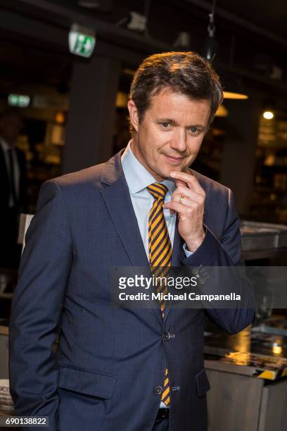 Crown Prince Frederik of Denmark is seen visting Paradiset, an organic grocery store, on May 30, 2017 in Stockholm, Sweden.