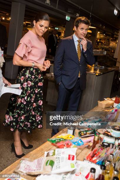 Crown Princess Victoria of Sweden and Crown Prince Frederik of Denmark are seen visting Paradiset, an organic grocery store, on May 30, 2017 in...