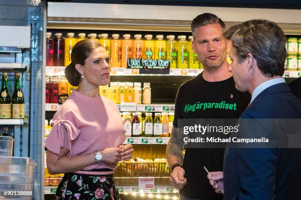 Crown Princess Victoria of Sweden and Crown Prince Frederik of Denmark are seen visting Paradiset, an organic grocery store, on May 30, 2017 in...