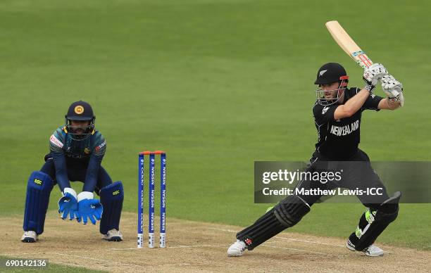 Kane Williamson of New Zealand edges the ball past Niroshan Dickwella of Sri Lanka during the ICC Champions Trophy Warm-up match between New Zealand...