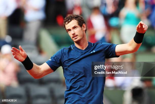 Andy Murray of Great Britain celebrates after winning his match with Andrey Kuznetsov of Russia during Day Three at Roland Garros on May 30, 2017 in...
