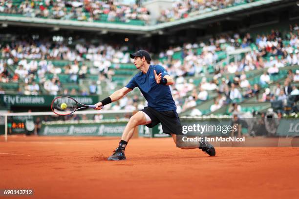 Andy Murray of Great Britain plays a forehand shot during his match with Andrey Kuznetsov of Russia during Day Three at Roland Garros on May 30, 2017...