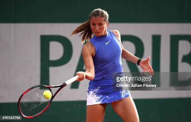 Annika Beck of Germany plays a forehand during the ladies singles first round match against Anastasija Sevastova of Latvia on day three of the 2017...