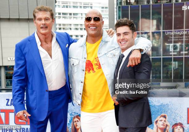 Actor David Hasselhoff, US Wrestler and actor Dwayne Johnson and US actor and singer Zac Efron attend the 'Baywatch' Photo Call in Berlin on May 30,...
