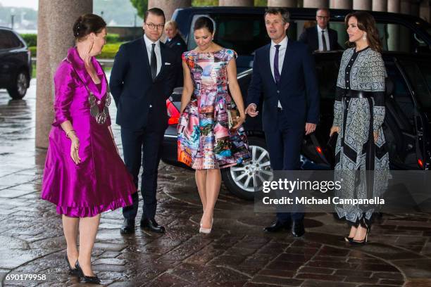 Prince Daniel and Princess Victoria of Sweden alongside Prince Frederik and Princess Mary of Denmark arrive Stockholm city hall for an official...