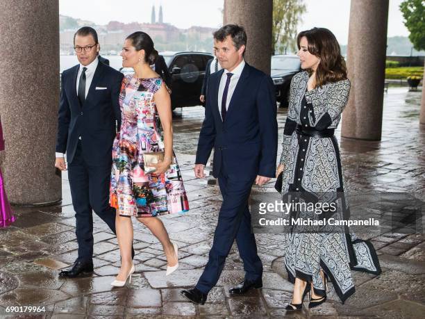 Prince Daniel and Princess Victoria of Sweden alongside Prince Frederik and Princess Mary of Denmark arrive Stockholm city hall for an official...