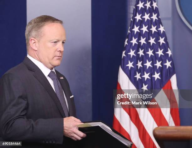 White House Press Secretary Sean Spicer walks up to speak to the media in the briefing room at the White House, on May 30, 2017 in Washington, DC.