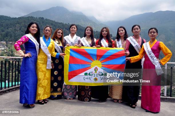 Miss Tibet participants pose for photograph during the Miss Tibet introduction round at Mcleodganj Town on May 30, 2017 near Dharamsala, India. The...