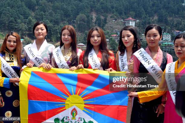 Miss Tibet participants pose for photograph during the Miss Tibet introduction round at Mcleodganj Town on May 30, 2017 near Dharamsala, India. The...