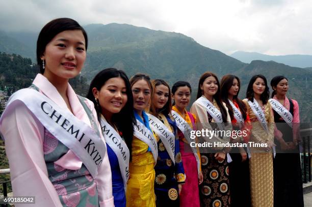 Miss Tibet Participants pose for photograph during the Miss Tibet introduction round at Mcleodganj Town on May 30, 2017 near Dharamsala, India. The...