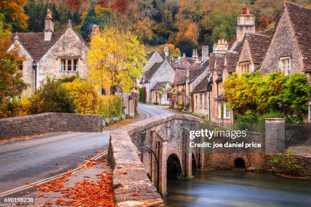 castle combe in wiltshire, england in the autumn - wiltshire stock pictures, royalty-free photos & images