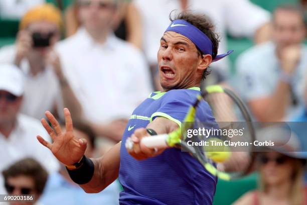 French Open Tennis Tournament - Day Two. Rafael Nadal of Spain in action against Benoit Paire of France on Court Suzanne-Lenglen during the Men's...