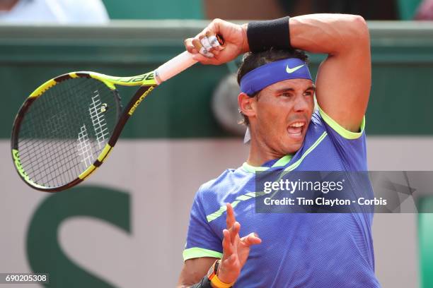 French Open Tennis Tournament - Day Two. Rafael Nadal of Spain in action against Benoit Paire of France on Court Suzanne-Lenglen during the Men's...