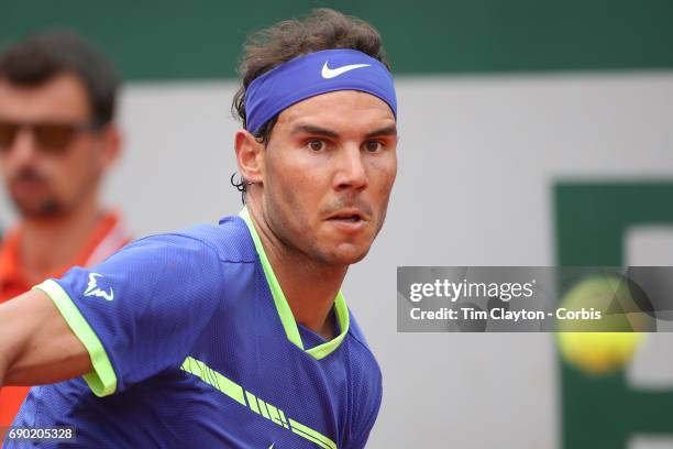 French Open Tennis Tournament - Day Two. Rafael Nadal of Spain in action against Benoit Paire of France on Court Suzanne-Lenglen during the Men's...