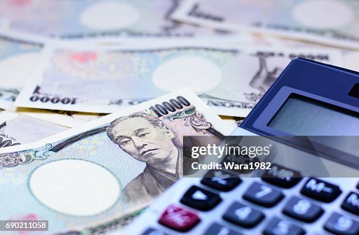 Japanese yen currency,money and calculator Japanese yen currency,money and calculator