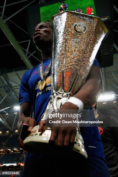 Paul Pogba of Manchester United celebrates with The Europa League trophy after the UEFA Europa League Final between Ajax and Manchester United at...