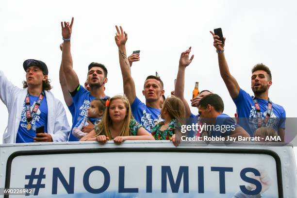 Huddersfield Town players and coaching staff on the open top bus on May 30, 2017 in Huddersfield, England.