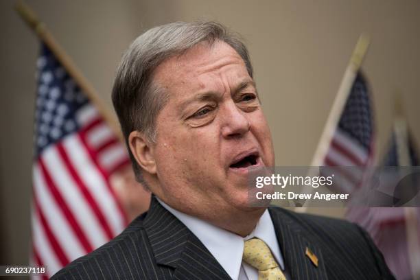 Joe Concannon, a retired NYPD captain and current candidate for NYC City Council District 23, speaks during a 'Support Your Police' rally outside of...