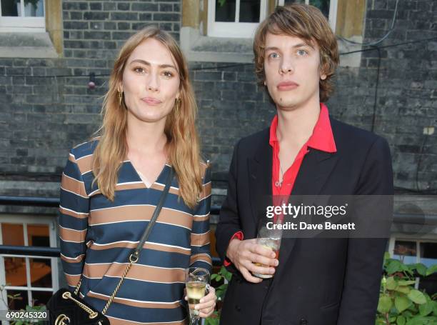 Sif Agustsdottir and Oliver Burslem attend the ALEXACHUNG London Launch & Summer 17 Collection Reveal at the Danish Church of Saint Katharine on May...