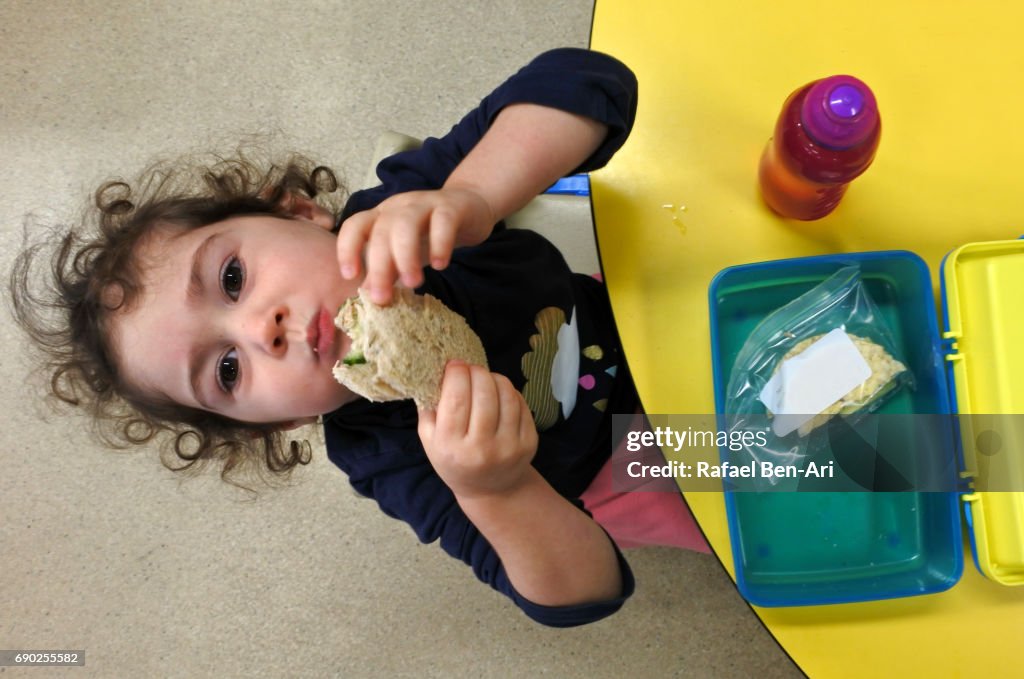 Small Girl Lunch From Her Lunch Box High-Res Stock Photo - Getty Images