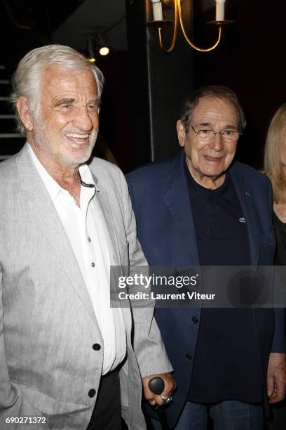 Jean-Paul Belmondo and Robert Hossein attend "Ca Coule de Source " Theater Play at Theatre de la Gaite Montparnasse on May 30, 2017 in Paris, France.