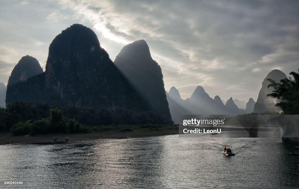 Sunset at foggy Li River, Guilin, China