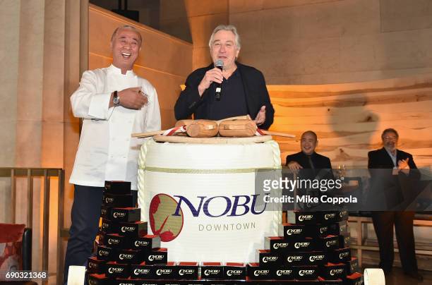 Chef Nobu Matsuhisa and Robert De Niro speak onstage during the Nobu Downtown Sake Ceremony at Nobu Downtown on May 30, 2017 in New York City.