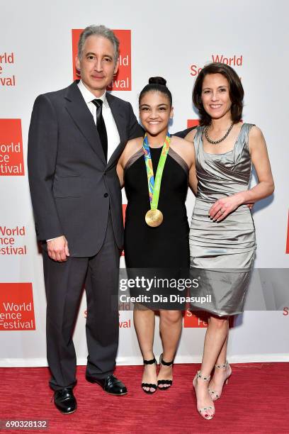 Brian Greene, Laurie Hernandez, and Tracy Day attend the World Science Festival 2017 Gala at Jazz at Lincoln Center on May 30, 2017 in New York City.