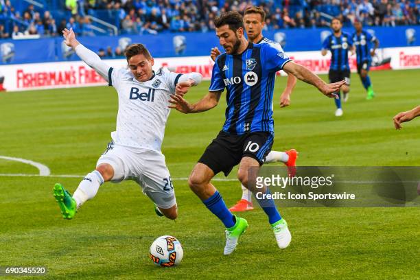 Hard fight by Montreal Impact midfielder Ignacio Piatti to keep control of the ball while chased by Vancouver Whitecaps defender Jake Nerwinski...