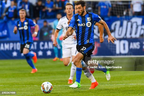 Montreal Impact midfielder Ignacio Piatti running in control of the ball on an offensice sequence during the Montreal Impact versus the Vancouver...