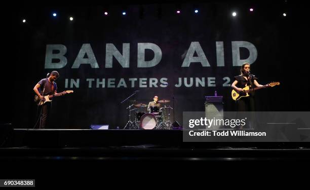 Adam Pally, Zoe Lister-Jones and Fred Armisen perform at the after party for the premiere of IFC Films' "Band Aid" on May 30, 2017 in Los Angeles,...