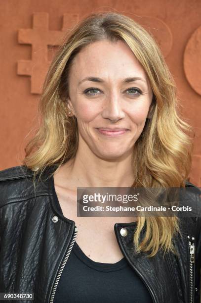 Journalist Laurie Delhostal attends the 2017 French Tennis Open - Day Three at Roland Garros on May 30, 2017 in Paris, France.