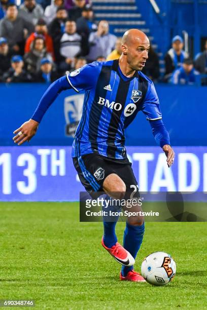 Montreal Impact defender Laurent Ciman looking for a teammate to pass the pall to during the Montreal Impact versus the Vancouver Whitecaps FC game...
