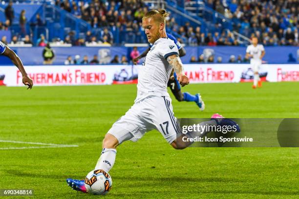 Look on Vancouver Whitecaps defender Marcel de Jong about to kick the ball away during the Montreal Impact versus the Vancouver Whitecaps FC game on...