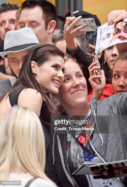 Actress Alexandra Daddario with fans during the Baywatch European Premiere Party on May 31, 2017 in Berlin, Germany.