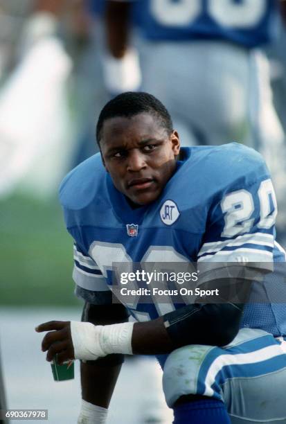 Running back Barry Sanders of the Detroit Lions looks on from the sidelines against the Tampa Bay Buccaneers November 10, 1991 during an NFL football...