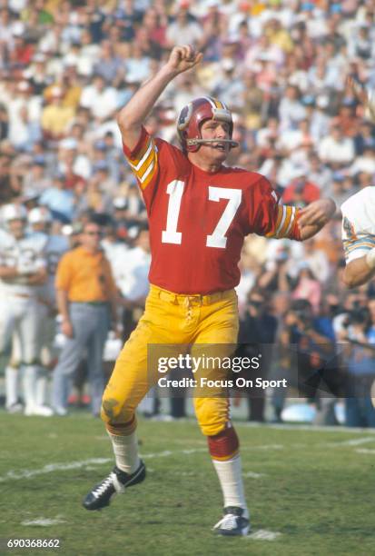 Billy Kilmer of the Washington Redskins throws a pass against the Miami Dolphins during Super Bowl VII at the Los Angeles Memorial Coliseum in Los...