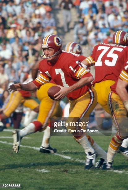 Billy Kilmer of the Washington Redskins in action against the Miami Dolphins during Super Bowl VII at the Los Angeles Memorial Coliseum in Los...