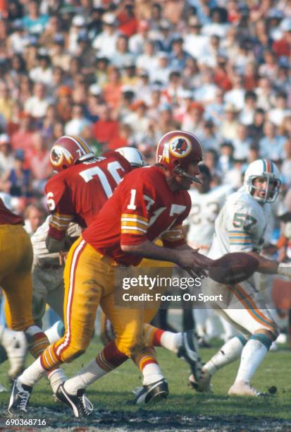 Billy Kilmer of the Washington Redskins in action against the Miami Dolphins during Super Bowl VII at the Los Angeles Memorial Coliseum in Los...