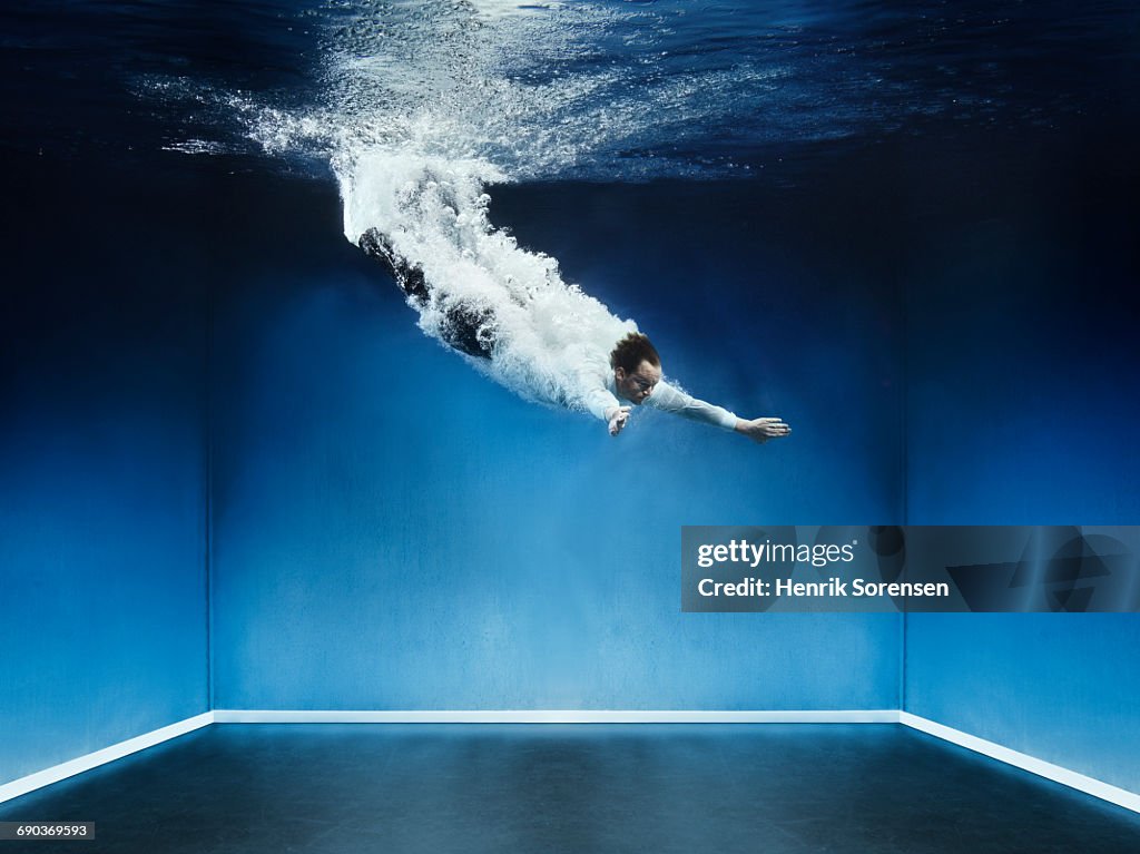 Man diving into water