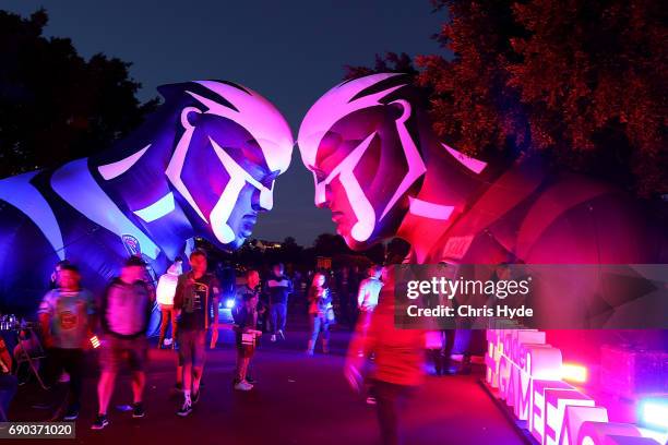 Crowds arrive through a Blues and Maroons mascot outside Suncorp before the State Of Origin series between the Queensland Maroons and the New South...