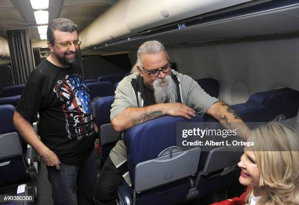 Actor Scott Engrotti, actress Chanel Ryan and director Massimiliano Cerchi on set For the film "Mayday" held at Jets and Props on May 30, 2017 in...