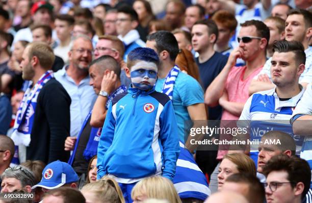 Glum looking Reading fan with a painted face during the Sky Bet Championship Play Off Final match between Reading and Huddersfield Town at Wembley...