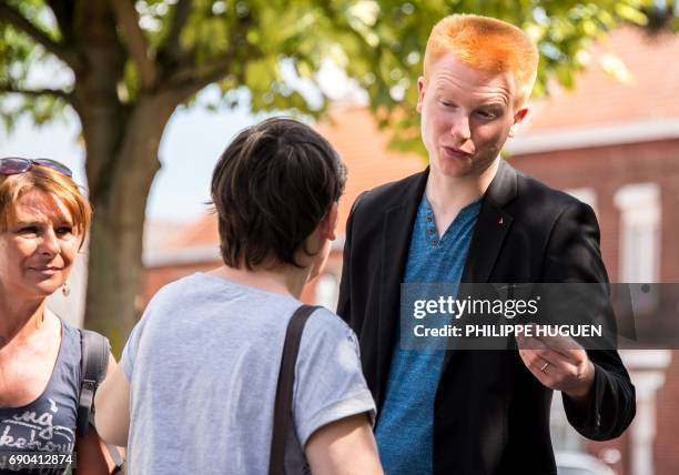 Candidate for the far-left France Insoumise party for upcoming legislative elections in the 1st constituency of Lille, Adrien Quatennens distributes...