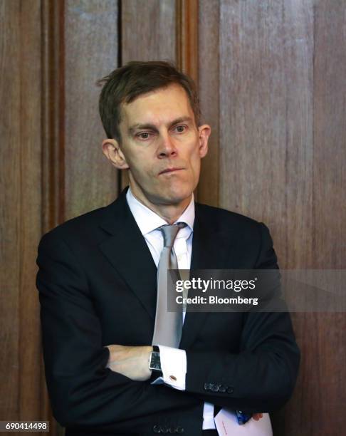 Seumas Milne, director of strategy and communications for the Labour Party, listens to speakers at a general-election campaign event in London, U.K.,...